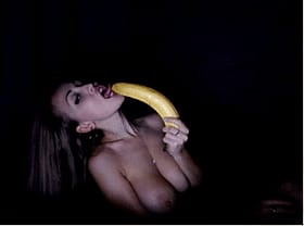 Sizzling Blonde Babe Goes Wild with Giant Banana & Luscious Melons'